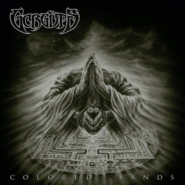 Album cover for the Gorguts album 'Coloured Sands'. Features an abstract image of a praying figure. whose head is not visible, but they seem to have 4 arms.