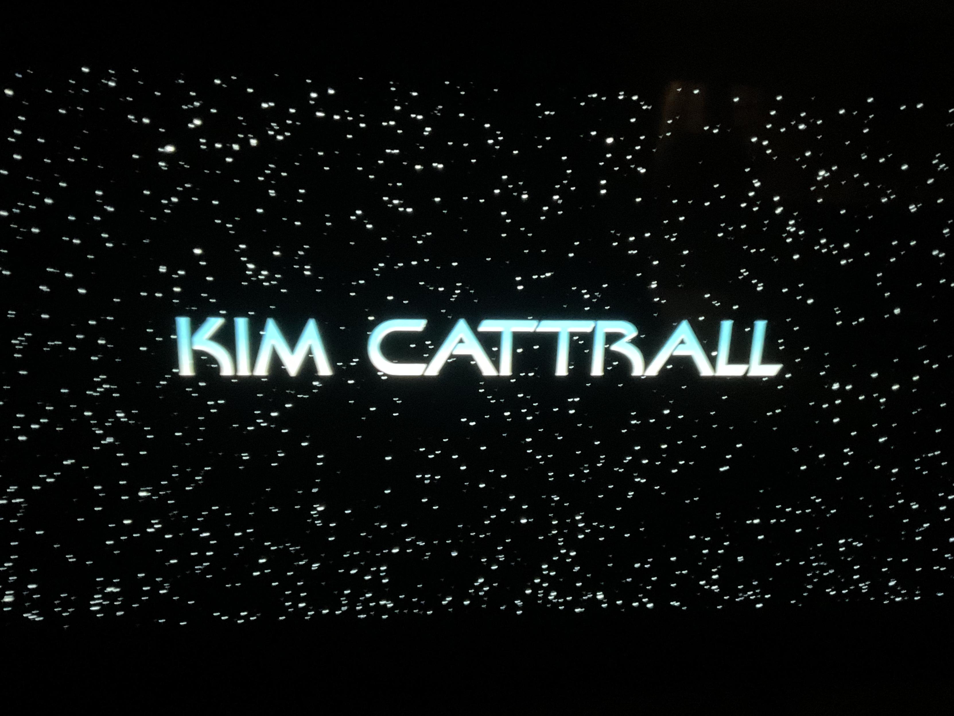 A starfield with the name Kim Kattrall in the Star Trek font.